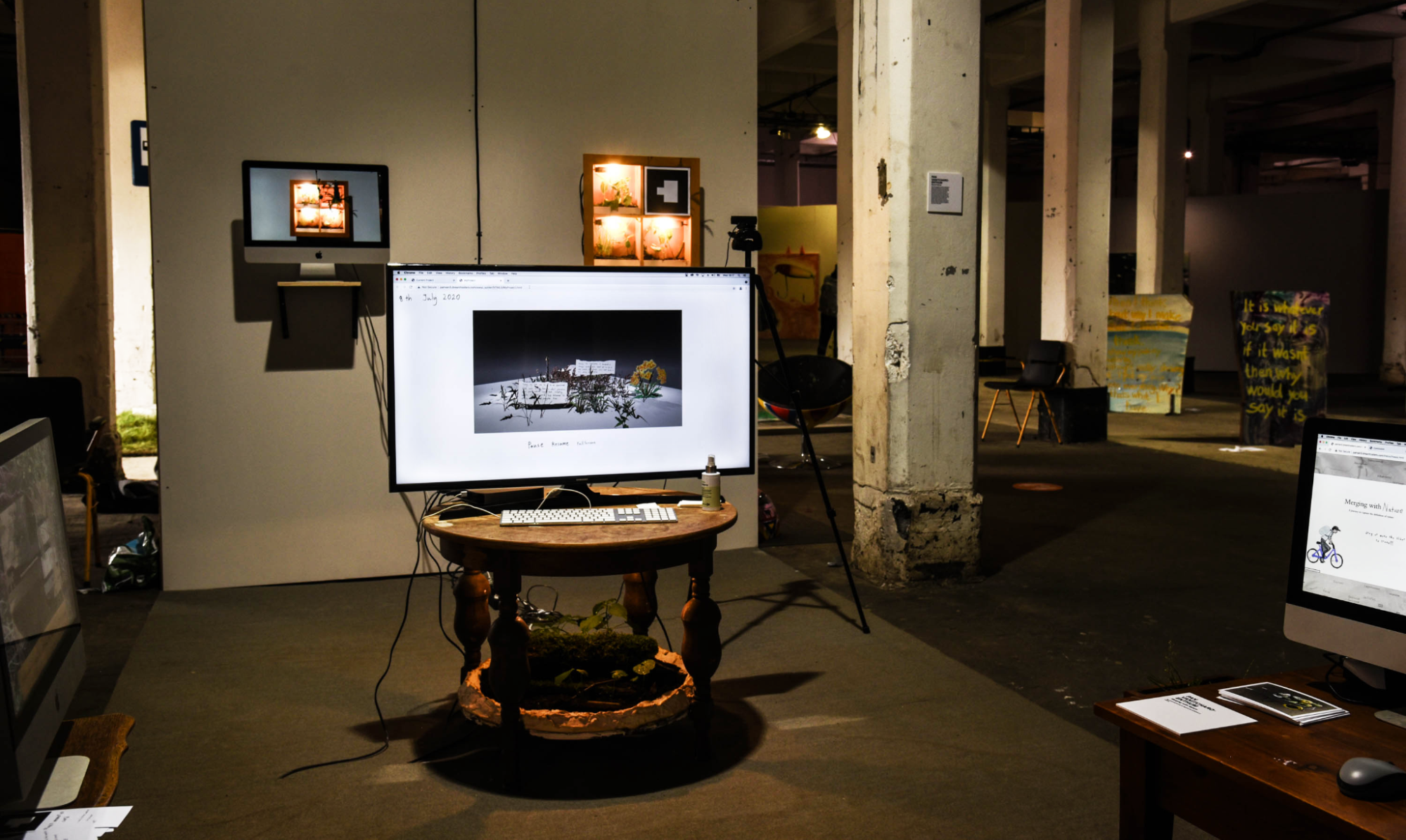 Second Nature - installation overview showing plants, computers, and augmented reality setup