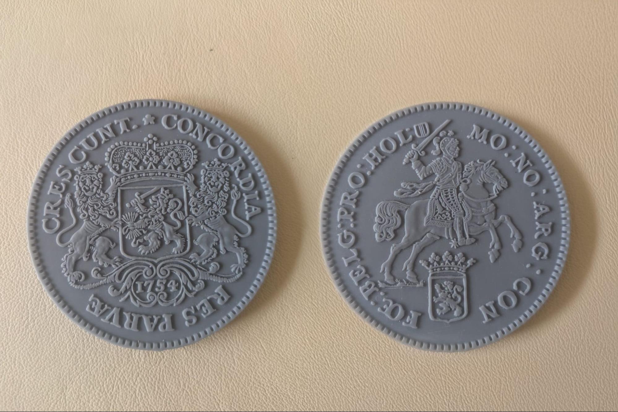 Tactile Zilveren Rijder coin - two coins side by side
